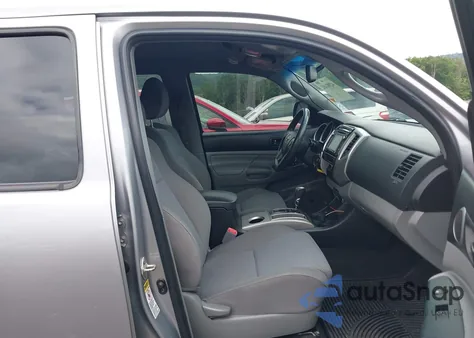 2014 Toyota Tacoma Base V6 z USA, uszkodzony, nr VIN 3TMMU4FN9EM064381